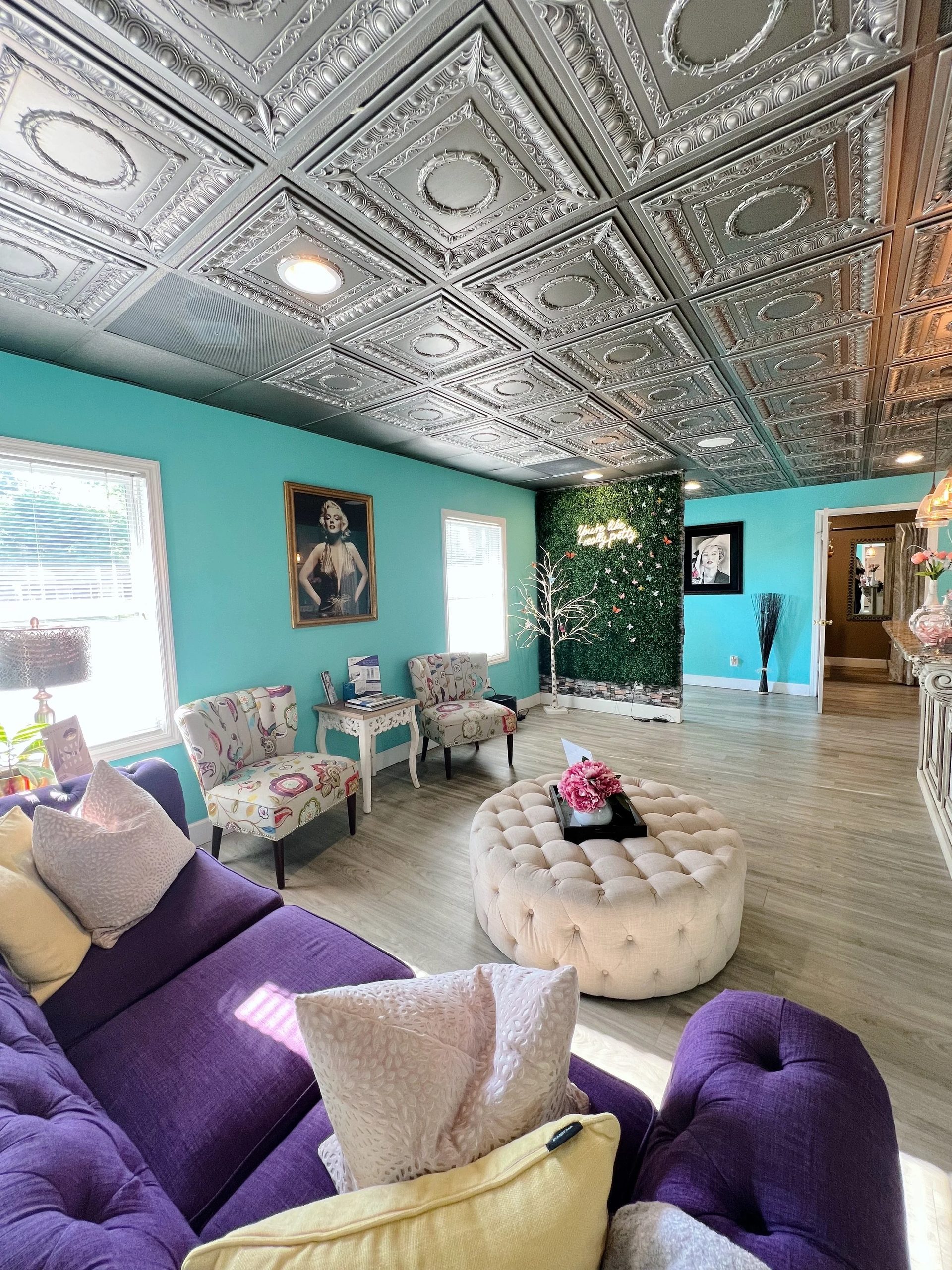 Lounge at All About Monroe in Demorest, Georgia, with the Marilyn Monroe portrait on the wall